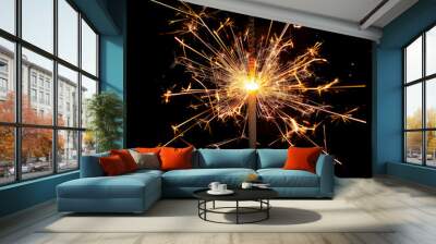 A sparkler is lit and the fire is bright and colorful Wall mural