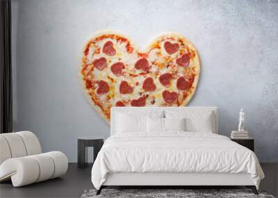 Heart shaped pizza with pepperoni. Valentines day romantic menu Wall mural