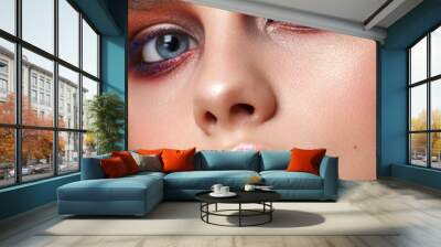 Beautiful young model with evening make up, perfect skin. Trendy colorful eye-shadows. Closeup portrait. Wall mural