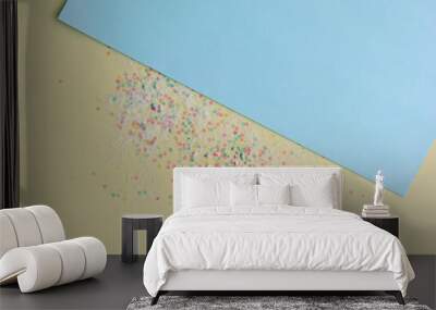 background in pastel colors, two sheets of paper - blue and yellow, round sequins for decoration Wall mural