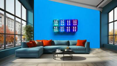 eight dices of blue transparent color showing number six on blue background. Free copy space. Concept of game, winning combination. Colored playing cubes. Top view Wall mural