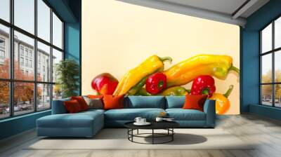 layout of Yellow and green peppers on yellow background. Concept of fresh food and healthy eating. Ready to eat. free copy space. Wall mural