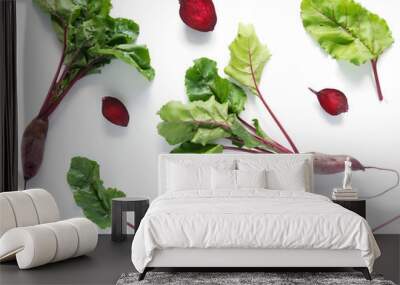 Composition of fresh beets with tops and beets in a cut isolated on a white background. Healthy food. Top view, flat lay. Wall mural