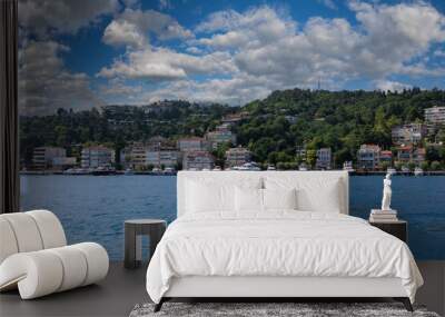 Turquoise blue sea water. View of the Bosphorus in Istanbul city on sunny summer day, in a public place. Wall mural