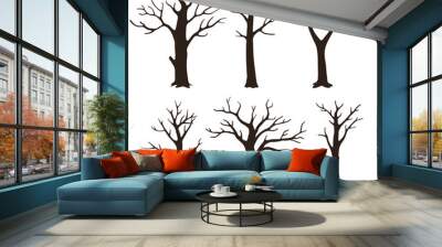 Set of bare tree silhouettes with leafless branches isolated on a white background. Wall mural