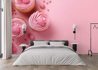 top view of cupcakes with pink buttercream frosting on pink background with copy space, ai generated Wall mural