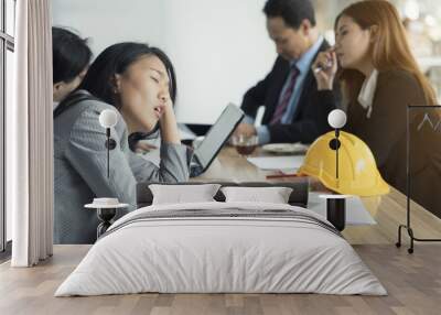 Bored businesswoman in conference meeting Wall mural