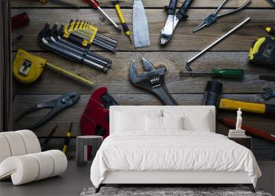 Old tools on a wooden table Wall mural