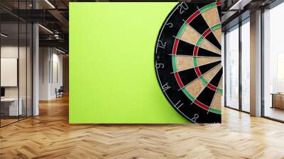 target dart board on the green background, center point, head to target marketing and business succe Wall mural