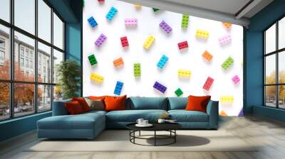 Colored toy bricks on white background Wall mural