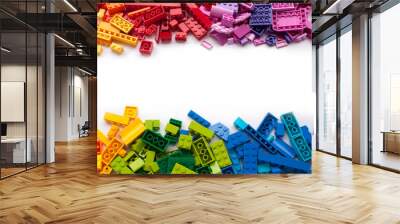 Colorful toy bricks frame with white empty space for your content Wall mural