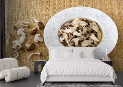 Stir fried mushroom in white dish on brown napery / Selective fo Wall mural