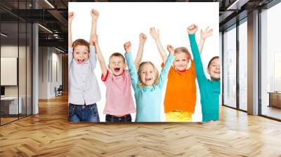 Happiness group children with their hands up Wall mural