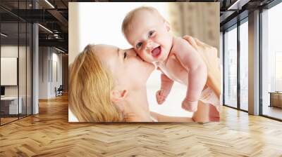 Mother with baby at home Wall mural