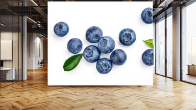 Fresh blueberries with bluberry leaves isolated on white background. Top vew. Wall mural