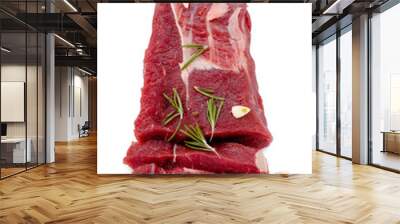 Pieces of meat with garlic and rosemary isolated on white background. Raw beef. Roast. Top view. Wall mural