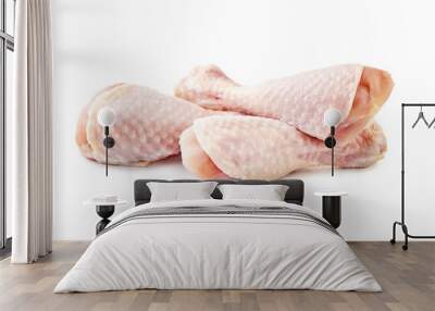 Raw chicken legs isolated on white background Wall mural