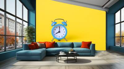 The alarm clock shows 8 am. Morning time. Clock face. Yellow background, deadline concept. Copy space, empty place for text. Business template. Bright color mockup. Layout. Wall mural