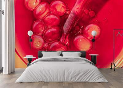 Liquid bloody red transparent serum with pipette on white isolated background Wall mural