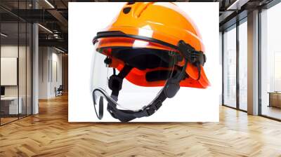 A safety helmet adorned with goggles, ready for action in a work or adventure setting Wall mural