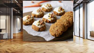 Keto Carrot oatmeal cookies. Healthy homemade ketogenic diet dessert decorated with white cream, nut and seeds. set on white cafe table background. Wall mural