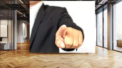 Business man with pointing to something or touching a touch screen on white background. Wall mural