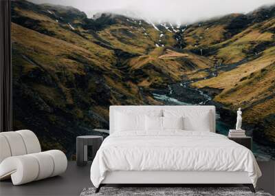 Natural hot spring pool in the mountains of Iceland at fall Wall mural