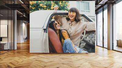 Portrait of young asian woman friends smiling with happy on road trip. Wall mural