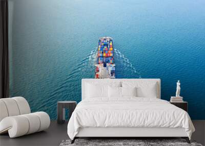 Aerial view of container cargo ship in sea. Wall mural