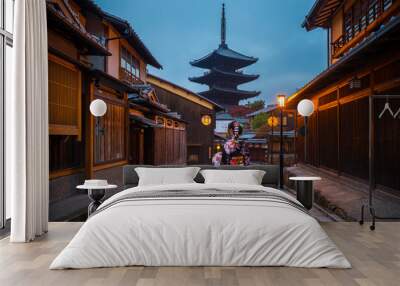 Asian woman wearing japanese traditional kimono at Yasaka Pagoda, Kyoto, Japan Wall mural