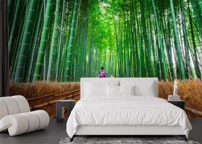 Bamboo Forest. Asian woman wearing japanese traditional kimono at Bamboo Forest in Kyoto, Japan. Wall mural