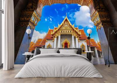 Women tourists at Wat Benchamabophit or the Marble Temple in Bangkok, Thailand. Wall mural