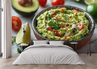 Bowl with tasty guacamole and ingredients on white background Wall mural