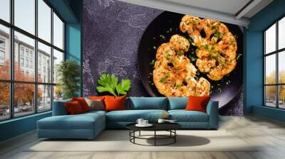 Cauliflower steak with spices cooked in the oven, top view. Wall mural