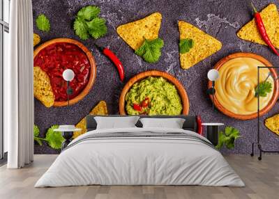 Mexican food background: guacamole, salsa, cheesy sauces Wall mural