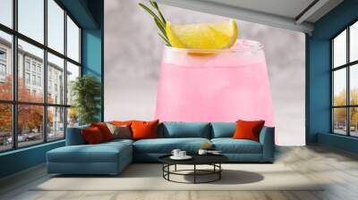 Refreshing pink drink or cocktail with ice Wall mural