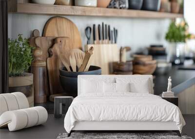 A kitchen countertop with wooden cutting boards, a black bowl, and a plant. There are also oranges on a wooden cutting board in the foreground. Wall mural