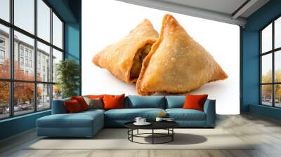 Samosa, A popular deep-fried pastry filled with a savory mixture of spiced potatoes, peas, and sometimes meat, often served with chutney, isolated on white background Wall mural