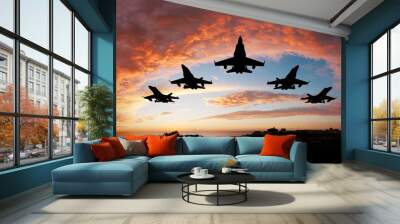 fighter flying in the sky at sunset Wall mural