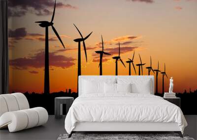 Wind farm at sunset. Wall mural