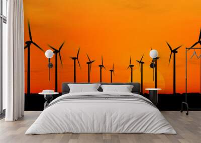 wind generators over orange sky Wall mural