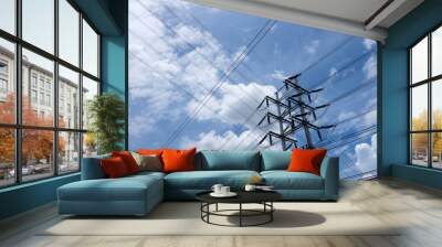 Electric pole with many wires on sky background. Wall mural