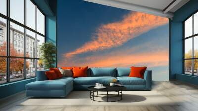 background of the sky with clouds at sunset Wall mural