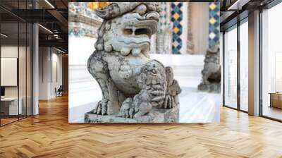 Carving stone lion in Chinese style is popular used to show around Buddhism temple in Thailand and Southeast Asia countries. Wall mural