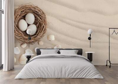 A nest with three eggs and shells on a sandy beach Wall mural