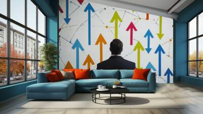 abstract business man stands on the peak of success amid tall, innovative Arrows point the way to success. and graphs with statistics to analyze business potential and predict future developments in Wall mural