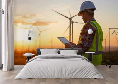 Wind energy engineer Industrial workers tablet sunset, teamwork in wind resource assessment, teamwork in technology deployment, teamwork in energy transition, concept Wind energy green power Wall mural