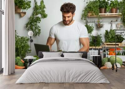 A smiling man cooking with fresh vegetables in a kitchen and a person gardening outside with flowers and fruits Wall mural