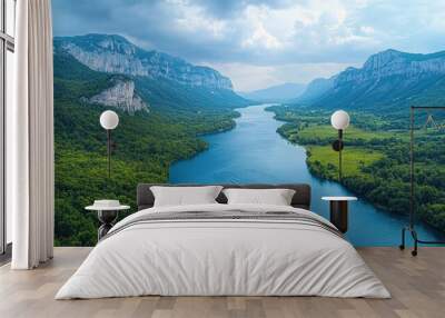 Scenic view of a river flowing through a valley, viewed from an elevated angle, showcasing the beauty of nature  Wall mural