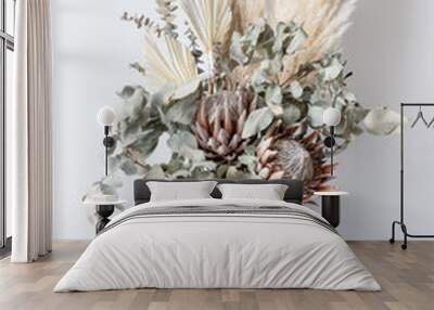 Beautiful dried flower arrangement in a stylish pink vase. In the flower bunch is pink King Proteas, Palm Frond, Eucalyptus leaves, Amaranthus and Pampas grass, photographed on a white background. Wall mural